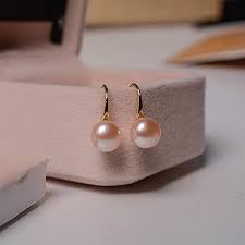 Pendientes de Perlas Hmzidz: Elegancia Atemporal
